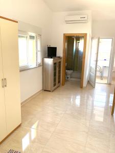 TV a/nebo společenská místnost v ubytování Apartments Buba Vir