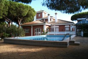 The swimming pool at or close to LUXURY STYLE VILLA AURORA Roche