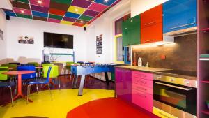 A kitchen or kitchenette at Apartment COLOURS - your 7 colour experience in centre of Prague