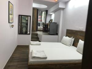 塔司瓦马西住宿加早餐旅馆客房内的一张或多张床位