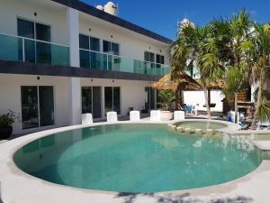Bazén v ubytování Villas del Carmen Holbox nebo v jeho okolí