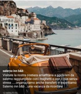 an advertisement for a car parked on the side of a road at Salerno Inn B&B in Salerno