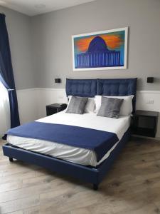 Giường trong phòng chung tại Dimorra Boutique Rooms