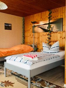 En eller flere senge i et værelse på Landgasthaus & Pension Liebner-Land Brandenburg-Prignitz