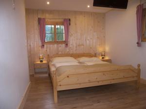 Postel nebo postele na pokoji v ubytování Ferienhütte Troadkostn