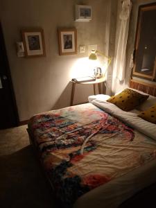 Postel nebo postele na pokoji v ubytování VELA Sustainable Living