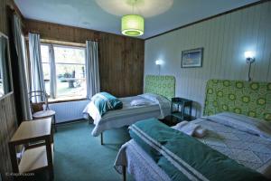 Postel nebo postele na pokoji v ubytování La Gringa Carioca