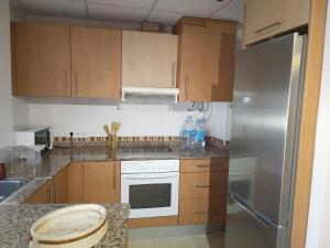 Kuchyňa alebo kuchynka v ubytovaní Apartamento San Carlos de la Rápita