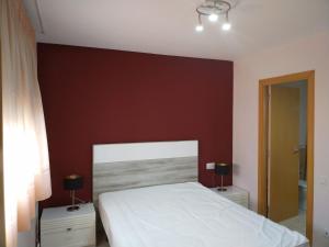 Posteľ alebo postele v izbe v ubytovaní Apartamento San Carlos de la Rápita