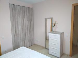 Posteľ alebo postele v izbe v ubytovaní Apartamento San Carlos de la Rápita