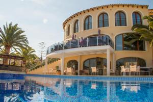 Bazén v ubytování Hostal Gran Sol nebo v jeho okolí
