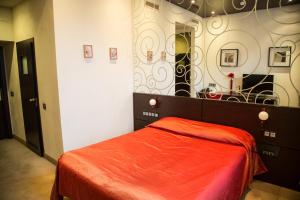 Voodi või voodid majutusasutuse Letuchaya Mysh Hotel toas