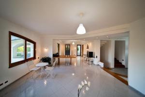 Posezení v ubytování Chiara’s Home + 37 fotografií