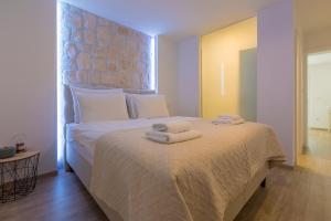 Postel nebo postele na pokoji v ubytování Palace Paulina Luxury Residence