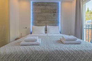 Postel nebo postele na pokoji v ubytování Palace Paulina Luxury Residence