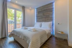 Postel nebo postele na pokoji v ubytování Palace Paulina Luxury Residence