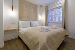 Postel nebo postele na pokoji v ubytování Palace Paulina Luxury Residence + 37 fotografií