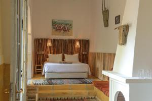 Кровать или кровати в номере Riad Laila
