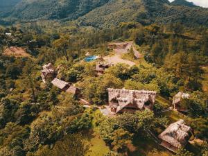 an aerial view of a house on a mountain at Vista Verde Lodge in Lanquín