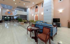 TV a/nebo společenská místnost v ubytování Sirene Beach Hotel