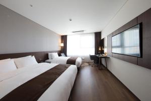 TV o dispositivi per l'intrattenimento presso Ramada by Wyndham Daejeon