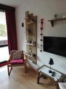 TV a/nebo společenská místnost v ubytování Ski-Garden