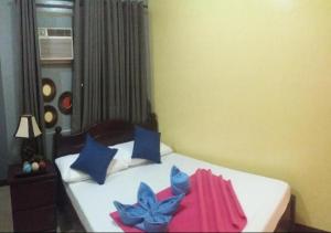 En eller flere senger på et rom på Connecting Flight Mactan Cebu Hostel
