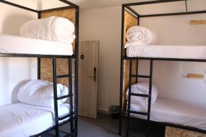 Postel nebo postele na pokoji v ubytování Nomads Hotel Petra