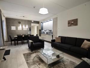 Posezení v ubytování Levillas Tunturinlaita Apartments