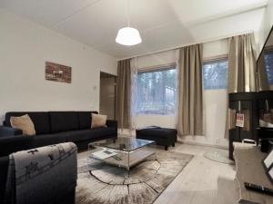 Posezení v ubytování Levillas Tunturinlaita Apartments