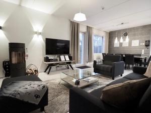 TV a/nebo společenská místnost v ubytování Levillas Tunturinlaita Apartments