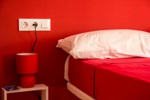 Posteľ alebo postele v izbe v ubytovaní Colors Flat