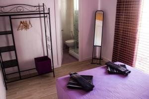 Posteľ alebo postele v izbe v ubytovaní Colors Rooms + 37 fotografií
