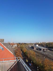 an overhead view of a train yard with tracks at Helle Dachgeschosswohnung für 8 Personen in zentraler Lage in Berlin