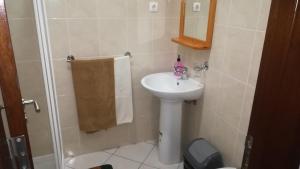 Kylpyhuone majoituspaikassa Basic Hotel