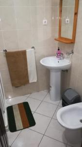 Kylpyhuone majoituspaikassa Basic Hotel