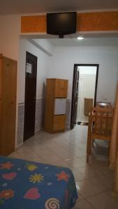 Vuode tai vuoteita majoituspaikassa Basic Hotel