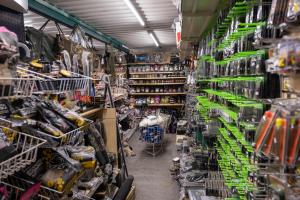 a store aisle filled with lots of shopping carts at Rum Bridge Fisheries "The Cabin" in Clare