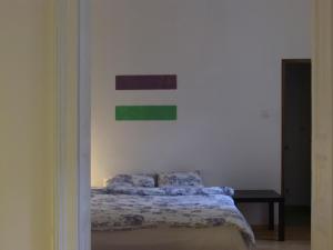 Cama o camas de una habitación en Green House Apartment