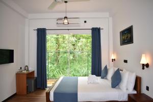 Letto o letti in una camera di Forest Edge Safari Villa