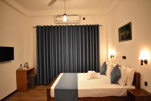 Letto o letti in una camera di Forest Edge Safari Villa