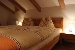 Postel nebo postele na pokoji v ubytování Haus Wohl