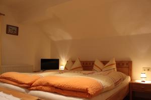 Postel nebo postele na pokoji v ubytování Haus Wohl