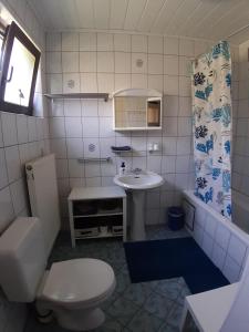 Baðherbergi á B&B Circuitez-vous