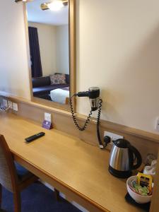 Postel nebo postele na pokoji v ubytování Stables Inn, Aintree