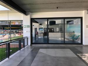 a lobby of a building with large glass doors at The Blyde Riverwalk Estate in Pretoria