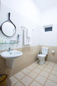 Koupelna v ubytování Nem's House Hội An + 32 fotografií