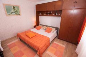 Postel nebo postele na pokoji v ubytování Apartments Damjan