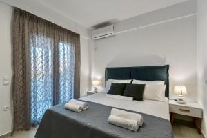 Postel nebo postele na pokoji v ubytování Villa Izabela Apartments with Private Pools + 37 fotografií