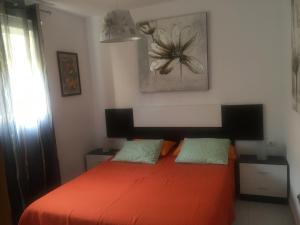 A bed or beds in a room at LasVistasApartment
